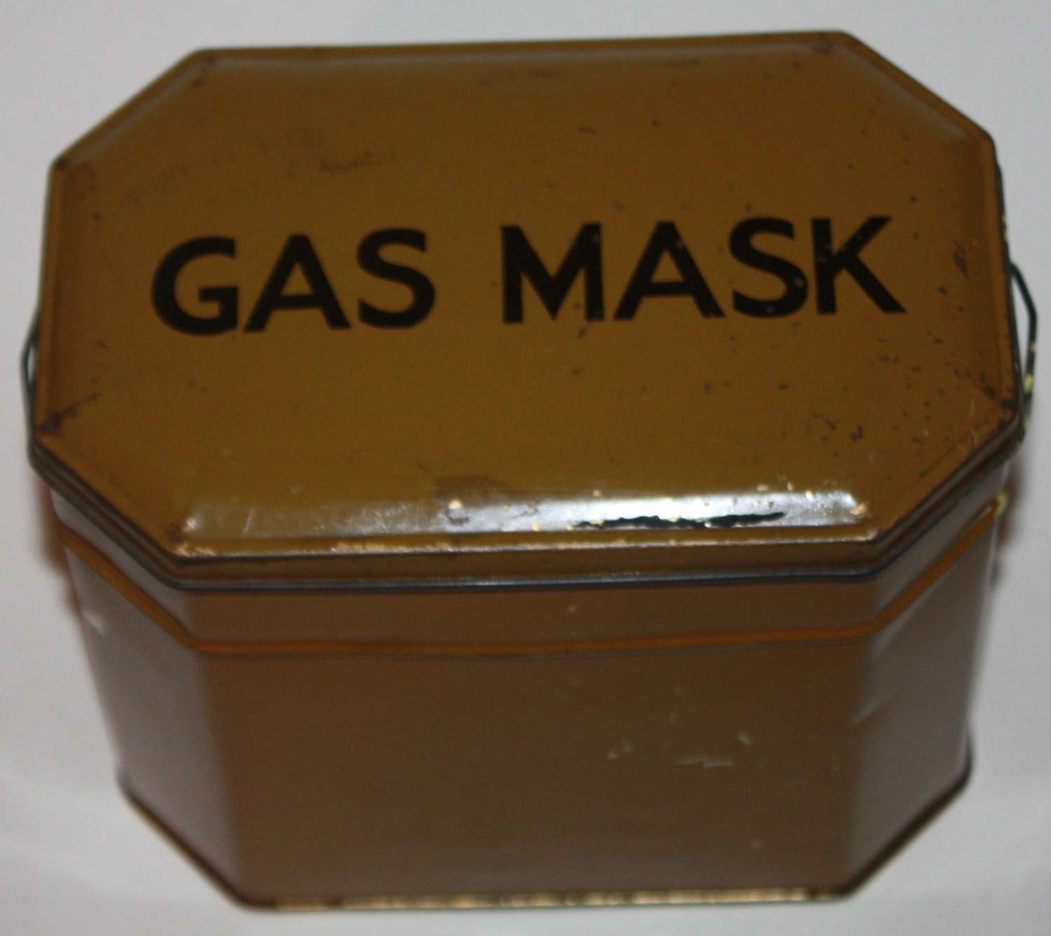 A good WWII British private purchase civilian gas mask tin