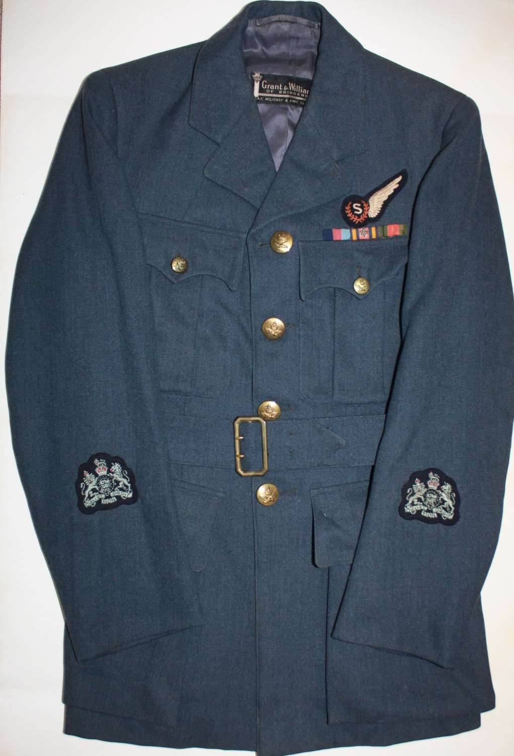 A WWII RAF Warrant Officers signalers tunic and log book grouping