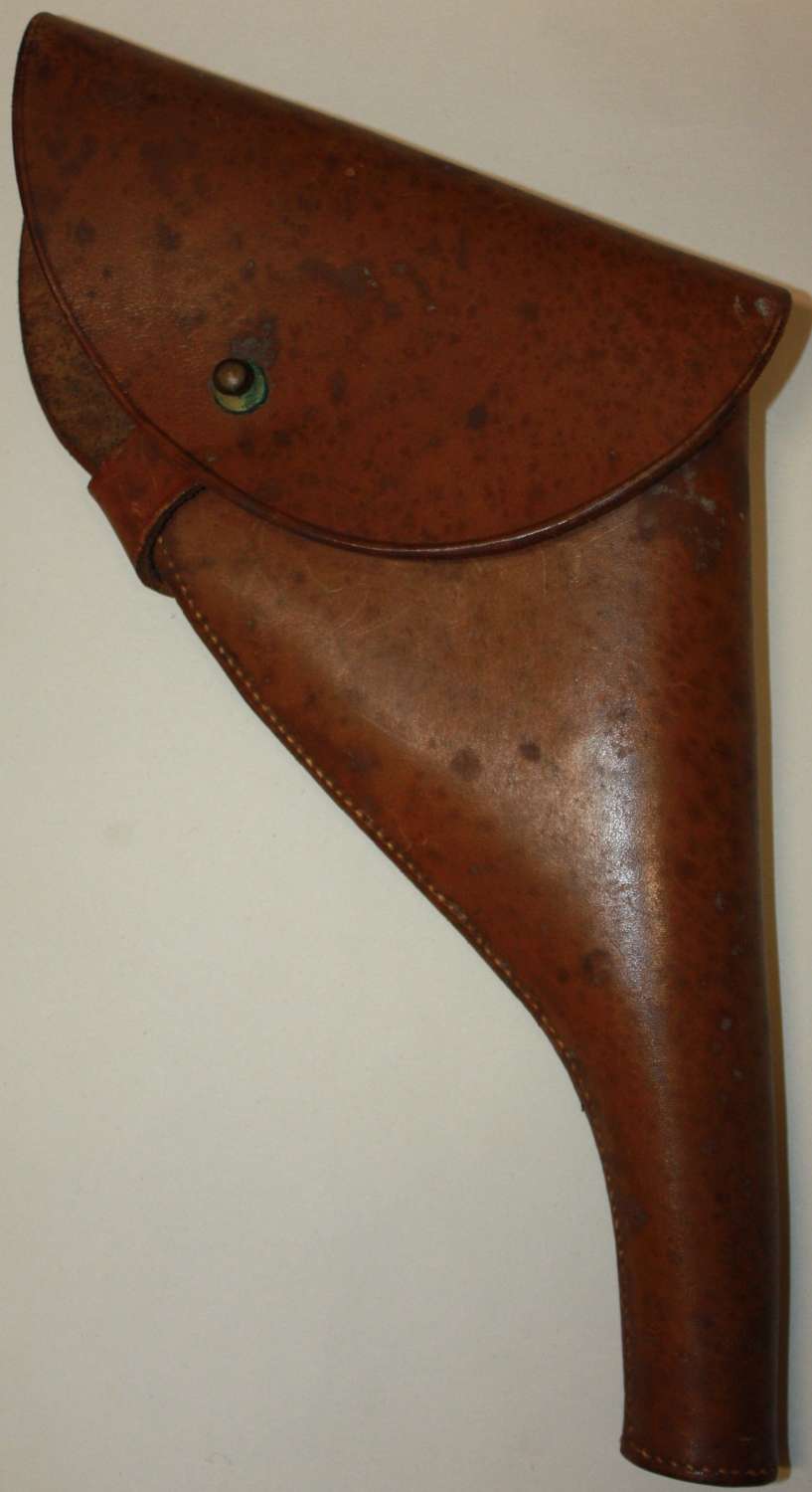 A SAM BROWN PISTOL HOLSTER WHICH IS FOR A .38 PISTOL