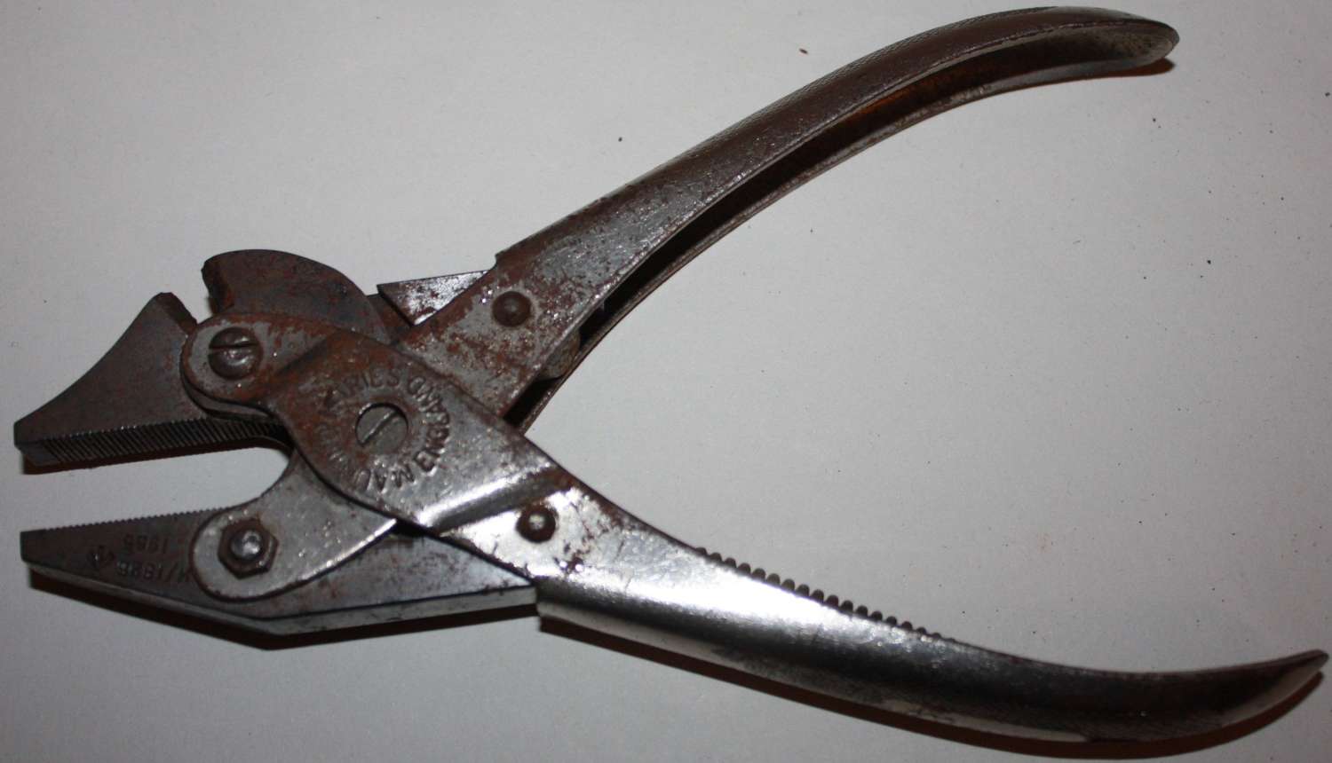 A PAIR OF MILIATRY CRIMPERS 1955 DATED