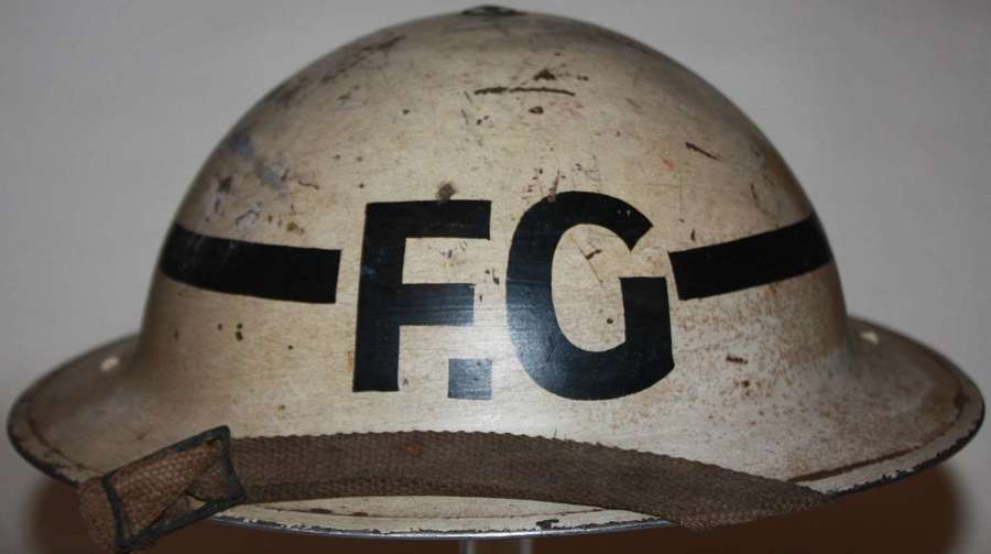 A GOOD WWII SENIOR FIRE GUARD WHITE AND BLACK STRIPED HELMET