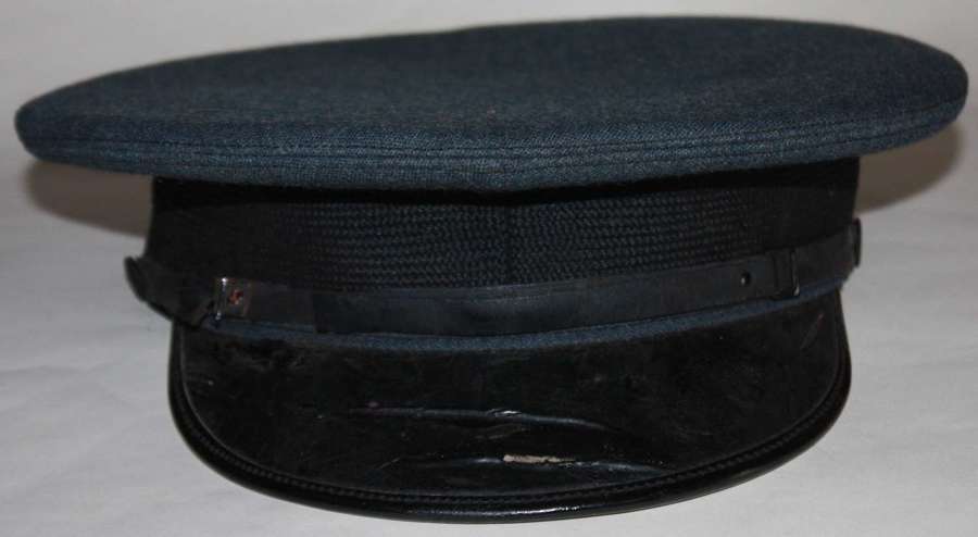 A very1938 dated RAF warrant officers peaked cap in officers material