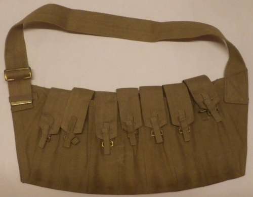 A WWII 7 POUCH STEN BANDOLIER WHICH IS 1944 DATED