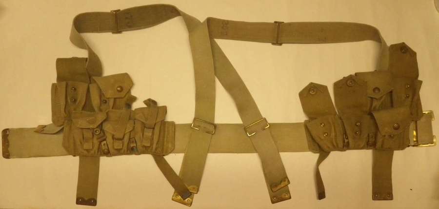 A part set of WWI webbing ammo pouches , belt and suspender straps